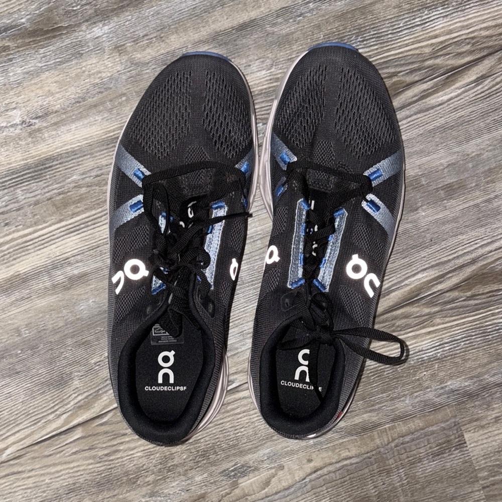 On Running Black Athletic Shoes with CloudTec Cushioning